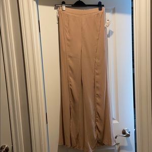 Sheer tan slit pants with built in shorts.